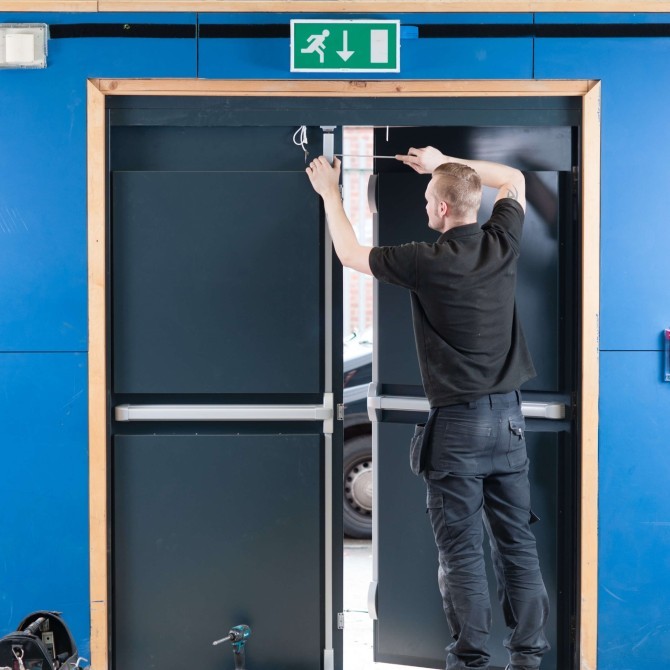 Strongdor City Academy Door Installation By Fitter